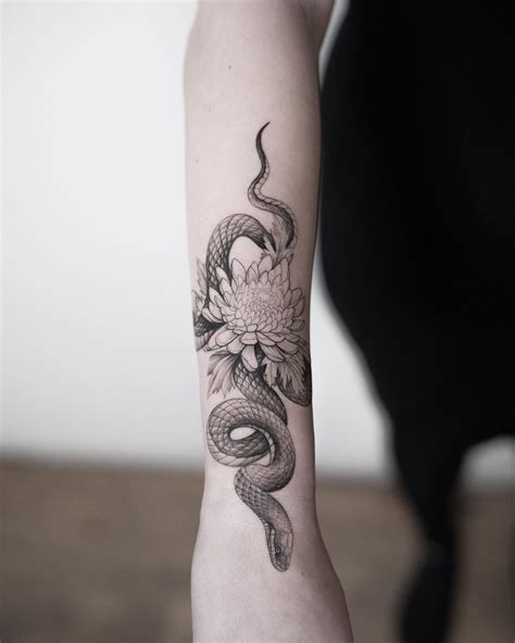 snake tattoo on arm | Snake tattoo design, Arm tattoos for women ...