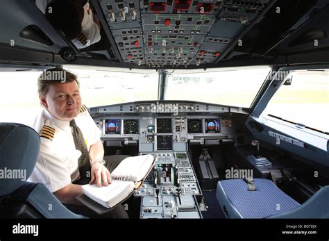 Easyjet Captain Roger Llewellyn sits in the cockpit of a new Airbus ...