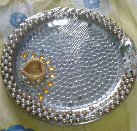 Puja Thali | Thali decoration ideas, Wedding gifts packaging, Diya designs