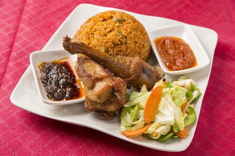 Ghanaian Jollof Rice & Chicken | African food, Food, Ghanaian food