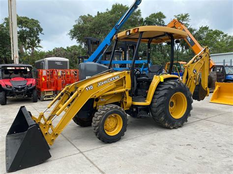 2011 JOHN DEERE 110 LOADER, BACKHOE, 4x4, DIESEL, OUTRIGGERS, RUNS AND ...