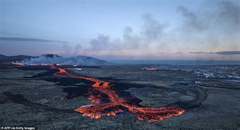 Horrifying footage shows lava from Iceland volcano engulfing homes ...