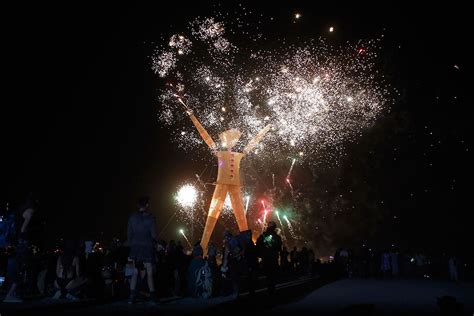 Fireworks explode above the Man just before it is set alight | Festival ...