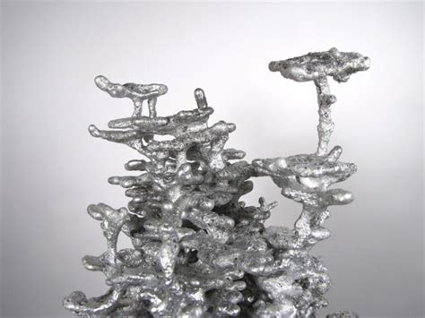 Ant Colony Sculptures Made by Pouring Molten Metal into Ant Nests