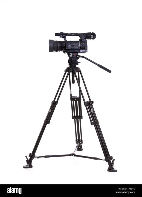 professional camcorder and tripod Stock Photo - Alamy