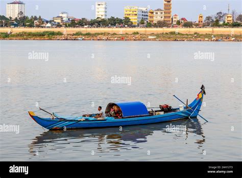 A Traditional Fishing Boat On The Mekong River, Phnom Penh, Cambodia ...