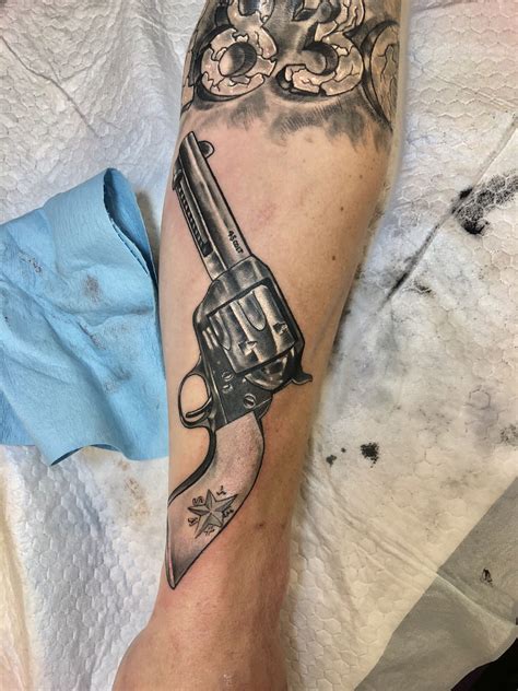 Revolver tattoo Done by: Derek Kastning Owner: HYDRA Tattoos Tyler ...