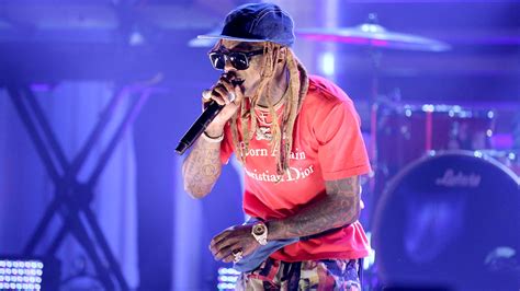 Lil Wayne concert ends after crowd panics over false gunshot reports ...