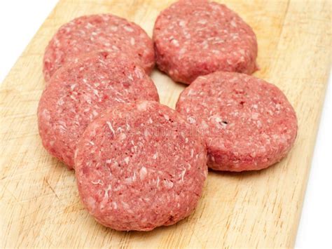 Raw beef burgers stock photo. Image of uncooked, food - 19315496