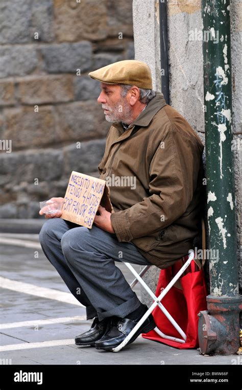 Beggar on the street in Spain Stock Photo - Alamy