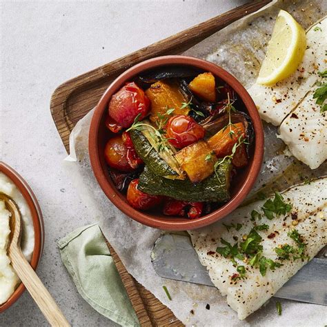 GRILLED HAKE FILLETS WITHLEMON BUTTER, MASH & ROAST VEGETABLES - I&J