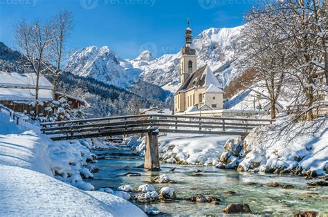 Winter landscape in the Bavarian Alps with church, Ramsau, Germany ...