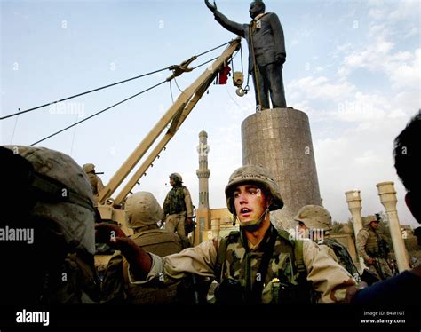 Iraq War 2003 Iraqi President Saddam Hussein s statue in Baghdad s al ...