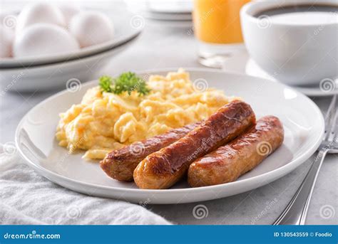 Scrambled Eggs and Breakfast Sausage Stock Image - Image of dish, baked ...