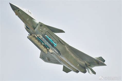 China's J-20 Stealth Fighter Stuns By Brandishing Full Load Of Missiles ...