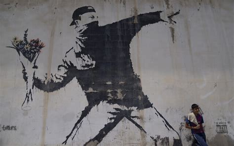 Banksy protest painting sprayed in West Bank resurfaces in swanky Tel ...