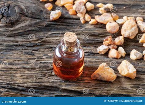 A Bottle of Styrax Benzoin Essential Oil with Benzoin Resin Stock Image ...