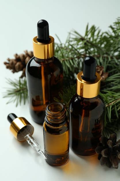 Premium Photo | Aromatherapy concept with pine oil on white