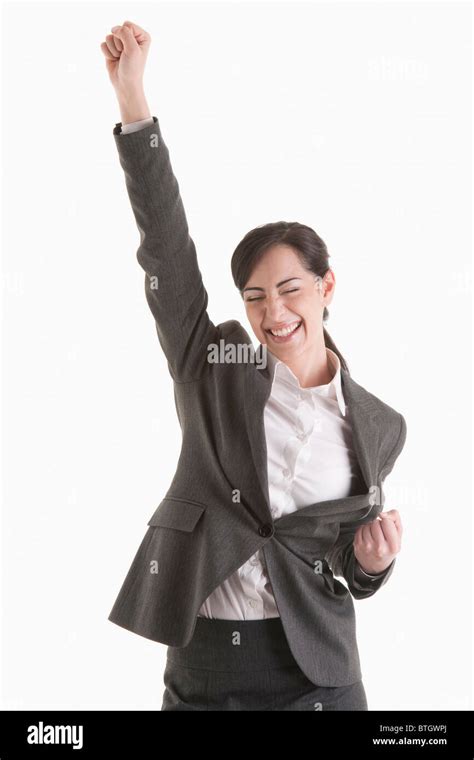 Woman holding fist up Stock Photo - Alamy