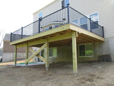 Deck Helical Piers - Hughes Construction