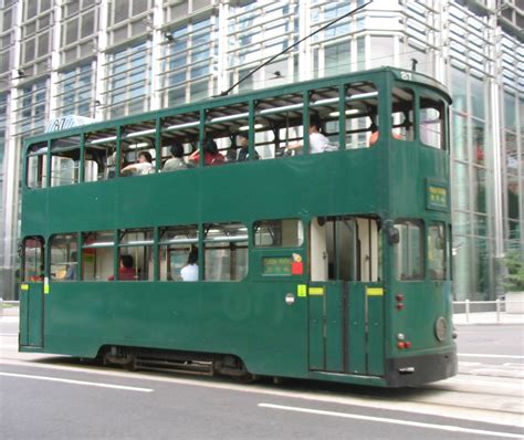 File:Hong Kong tram against building.jpg