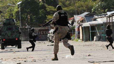 Hundreds of convicts escape as armed gangs storm Haiti's main prison in ...