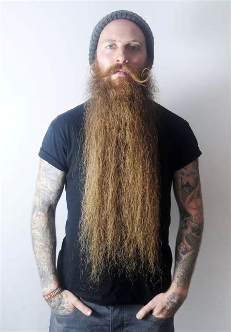 Meet the man with Britain's longest beard whose whiskers measure an ...