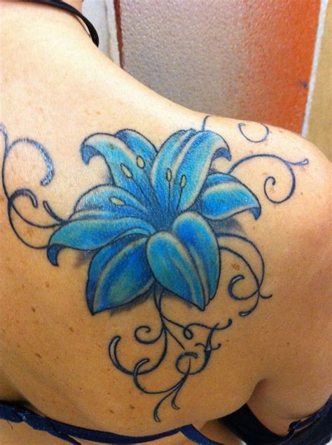 Blue Lily tattoo perfect to cover existing tattoo Calla Lily Tattoos ...