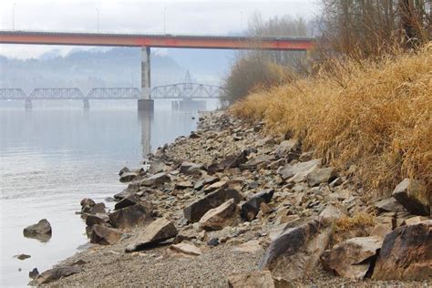 Riverbank Erosion and Applying Protection Stock Photo - Image of close ...