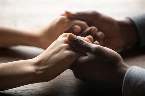 Mixed,Ethnicity,Family,Couple,Holding,Hands,On,Table,,Black,Man | The ...