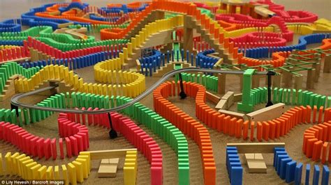 a toy train set with colorful tracks and rails