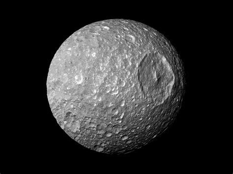 Bad Astronomy | Saturn's moon Mimas may have a liquid water ocean under ...