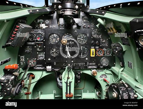 Cockpit of a Spitfire MkV showing the instrument panel and controls ...