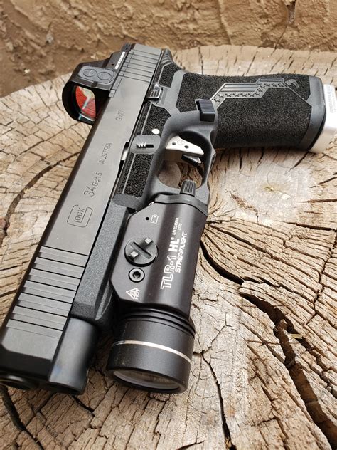 Glock 34 Gen 5 Custom Build with stainless accents : r/GunPorn