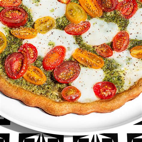 Pesto Mozzarella Tomato Pizza