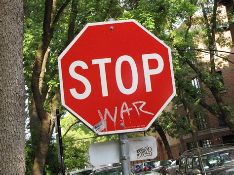 Stop sign graffiti | Graffiti turns a stop sign into an anti… | Flickr