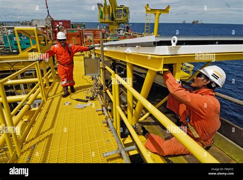 SONGKLA - JUNE 10: workers on offshore rig in gulf of Thailand from ...