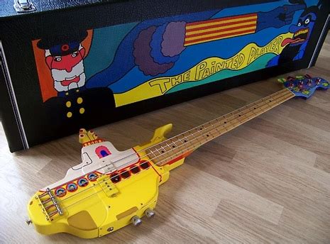 A Magnificently Detailed Custom Bass Guitar Made In the Shape of the ...