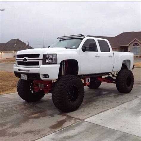 lifted Chevrolet Silverado white truck Chevy mudding anyone | Trucks ...