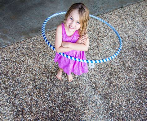 Toddler Tries Teaching Her Dog How To Hula Hoop [VIDEO]