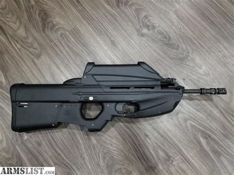 ARMSLIST - For Sale: FNH FN FS2000 WITH OPTIC