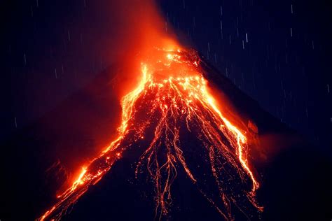 Philippine volcano spews lava fountains; 56,000 people flee | The ...