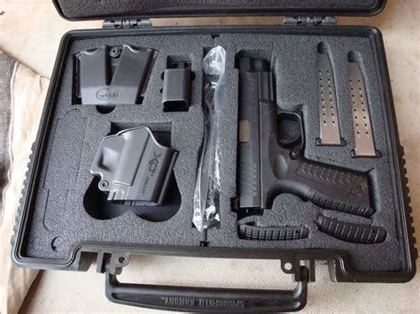 XDM 9mm 4.5" with a load of extra accessories, check it out ...