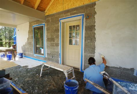 Applying Lime Plaster on Faswall Block Home | The Year of Mud