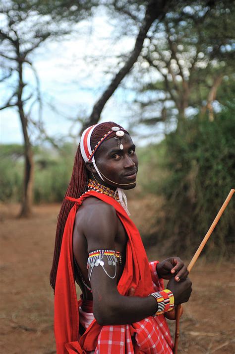 Masai Outdoors In Traditional Clothing Photograph by Christophe cerisier