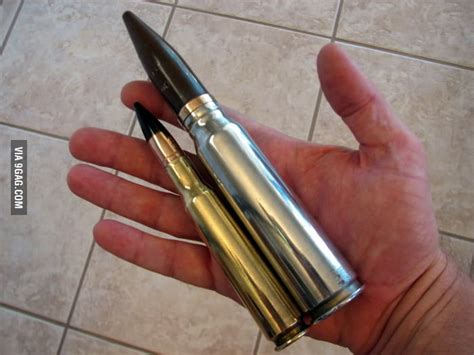 The small bullet is a .50 BMG, the larger one is the 20MM rifle round ...