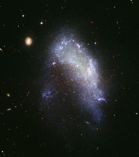 File:Irregular galaxy NGC 1427A (captured by the Hubble Space Telescope ...