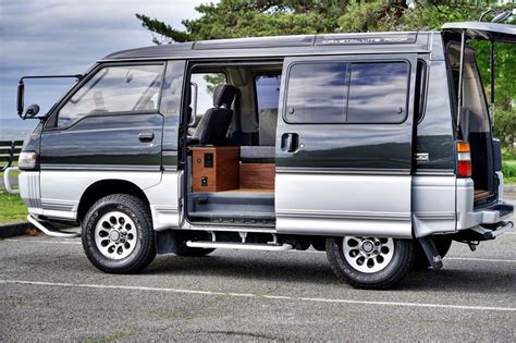 Rare four-wheel-drive van transformed into simple camper | Van, Delica ...