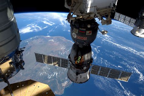 Space station marks milestone: 100,000th orbit of Earth - CBS News