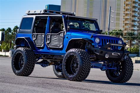 TIS Forged Wheels Adorining Electric Blue Wrangler — CARiD.com Gallery